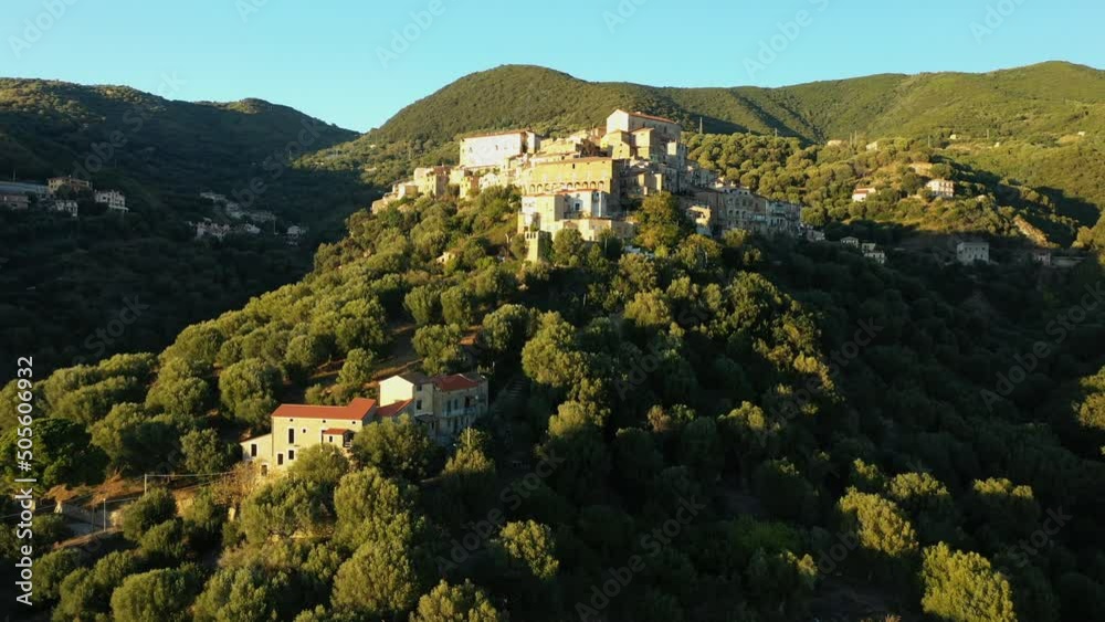 The medieval village of Pisciotta in the middle of the green mountains in Europe, Italy, Campania, in the summer on a sunny day. The medieval village of Pisciotta in the middle of the green mountains in Europe, Italy, Campania, in the summer on a sunny day.