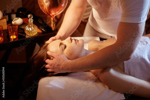 girl getting a therapeutic massage in a spa salon