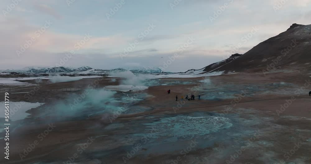 Tourists Sightseeing at Iceland's Namafjall Geothermal Hot Springs - Aerial Tourists Sightseeing at Iceland's Namafjall Geothermal Hot Springs - Aerial