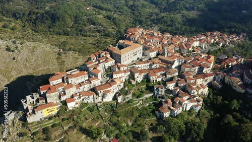 The traditional town center of Aieta on top of its cliff in Europe, Italy, Calabria in summer on a sunny day. photo