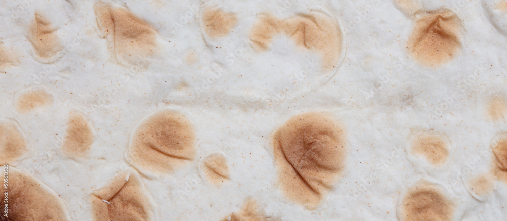 Lavash flatbread as a background. Lavash flatbread as a background.