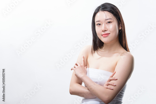 Beautiful Young asian Woman with Clean Fresh Skin look. Girl beauty face care. Facial treatment. Cosmetology, beauty and spa.