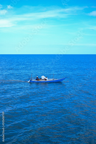 fishermen using boat in the ocean