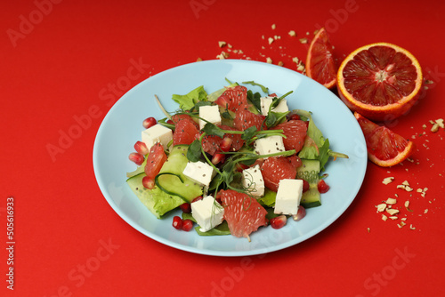 Concept of tasty food with salad with red orange