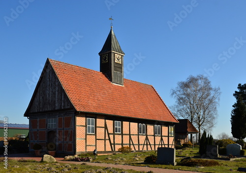Historische Kapelle im Frühling im Dorf Wittorf, Niedersachsen photo