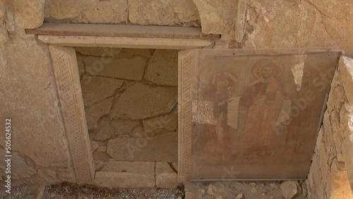 Demre, Turkey - 27th of October 2021: 4K Door and ancient sacred image behind protecting glass
 photo
