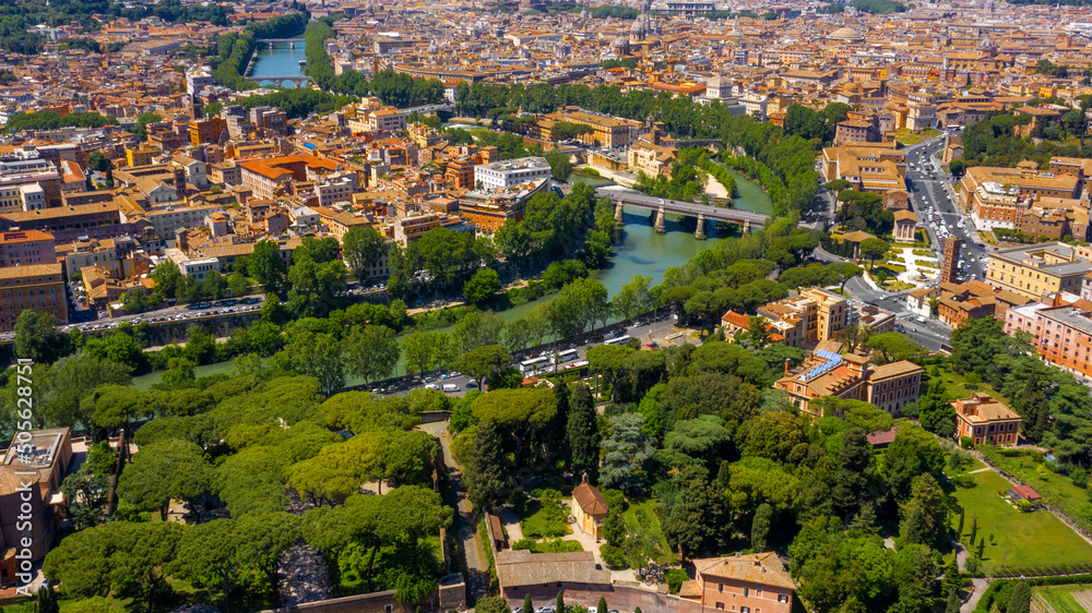 Aerial view of Trastevere district and Tiber Island, the only river island in the part of the Tiber which runs through Rome, Italy. In the period of ancient Rome, the temple of Asclepius stood here 