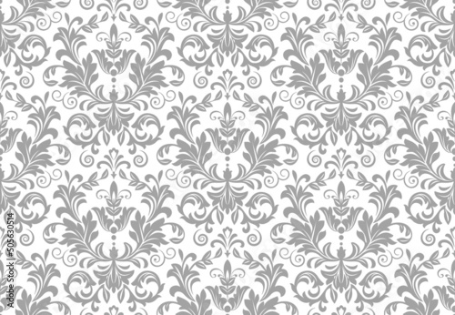 Wallpaper in the style of Baroque. Seamless vector background. White and gray floral ornament. Graphic pattern for fabric, wallpaper, packaging. Ornate Damask flower ornament.