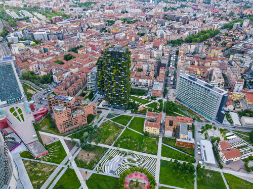 Aerial view of Milan Porta Nuova district, city skyline, business buildings and skyscrapers of Palazzo Regione Lombardia, Unicredit Tower, Bosco Verticale in Lombardy.