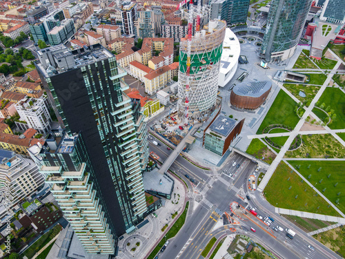 Aerial view of Milan Porta Nuova district, city skyline, business buildings and skyscrapers of Palazzo Regione Lombardia, Unicredit Tower, Bosco Verticale in Lombardy. photo