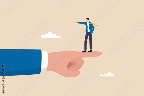 Employee conflict direction, argument between coworker, different thought, disagreement or opposite way, decision issue concept, tiny businessman standing on giant hand pointing in opposite direction. photo