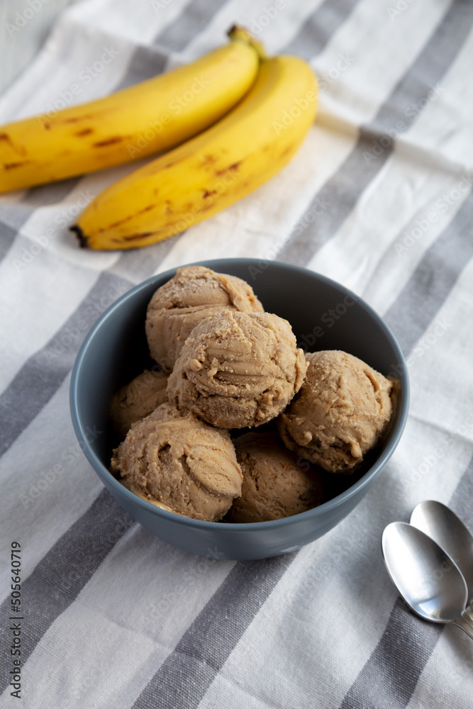 Homemade Peanut Butter Banana Ice Cream in a Bowl, side view. Homemade Peanut Butter Banana Ice Cream in a Bowl, side view.