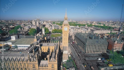 Ariel view of Parliament, Westminster, London. Morning sunlight, some traffic, Big Ben and Thames river. photo
