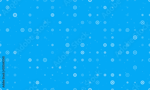 Seamless background pattern of evenly spaced white astrological sun symbols of different sizes and opacity. Vector illustration on light blue background with stars