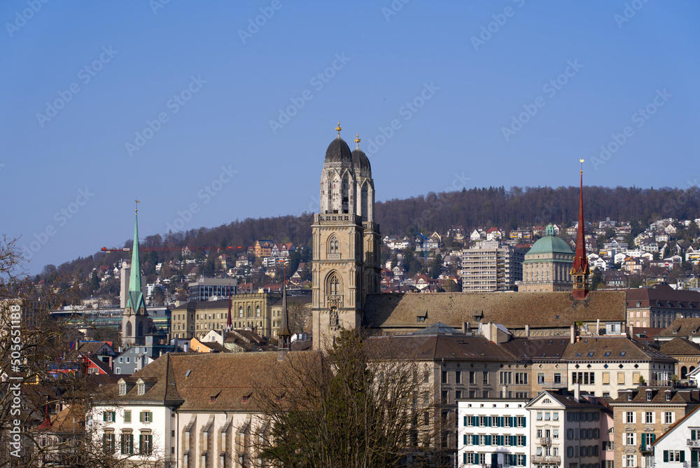 View over the medieval old town of Zürich with river Limmat and Protestant church Great Minster on a beautiful spring day. Photo taken March 28th, 2022, Zurich, Switzerland.