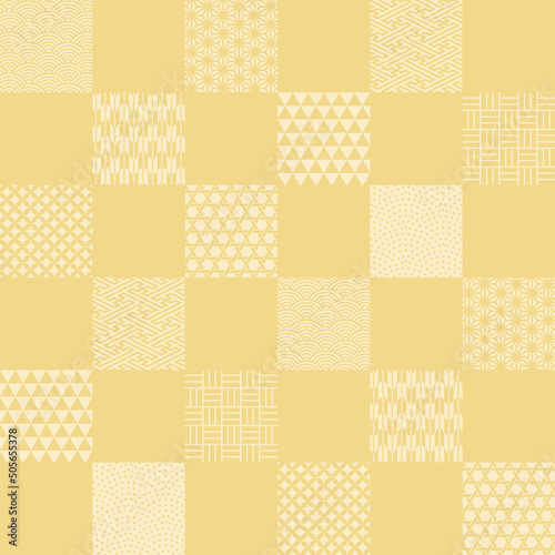 色々な和柄の入った金色の市松模様のパターン背景