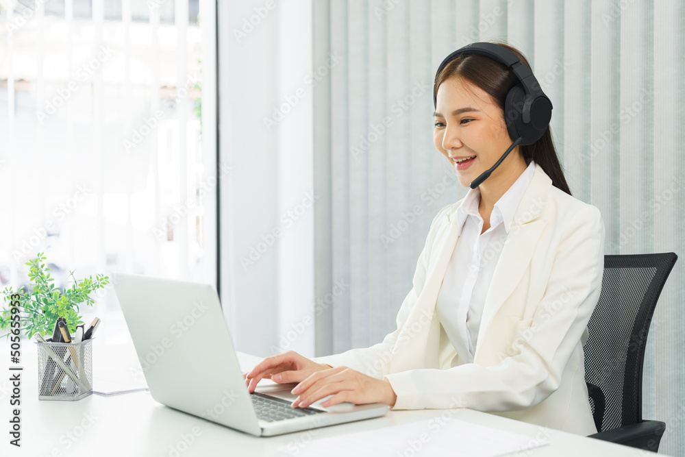 Confidence woman concept, Businesswoman wear headset to meeting with team on video conference Confidence woman concept, Businesswoman wear headset to meeting with team on video conference