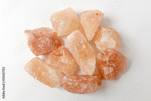 pink salt on a white background photo