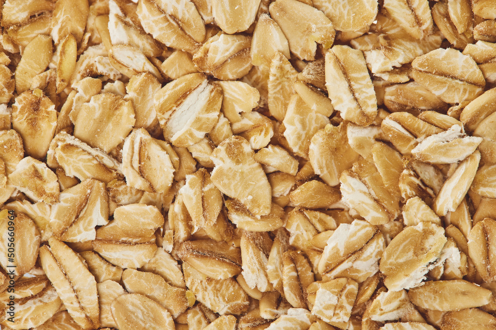 Macro image of raw oats cereal. Concept of healthy lifestyle. Natural food background.