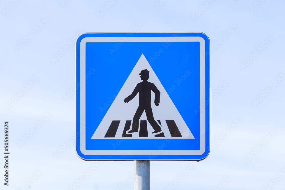 Pedestrian crossing sign on white background close up. Pedestrian crossing sign on white background close up.