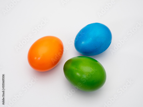 Colored eggs on a white background.