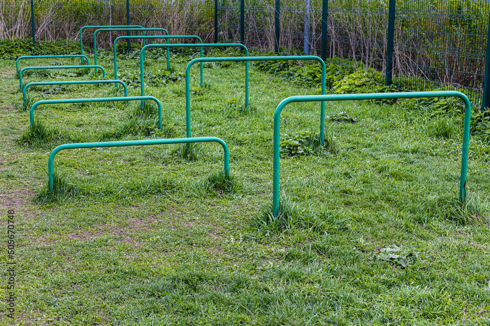 metal barrier at the dog training ground metal barrier at the dog training ground
