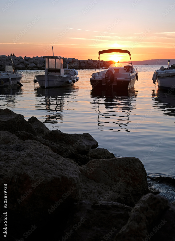 Boats at the coast of Marseille, France, during sunset