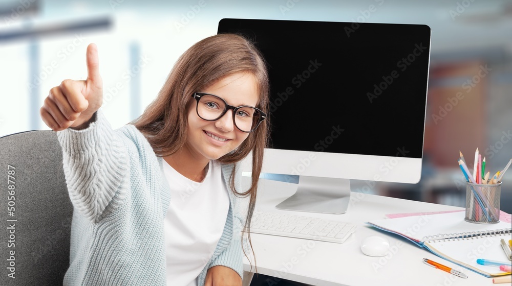 Cute girl in glass showing thumbs up. Videocall event, e-study from home, homeschooling. Conference concept. Cute girl in glass showing thumbs up. Videocall event, e-study from home, homeschooling. Conference concept.
