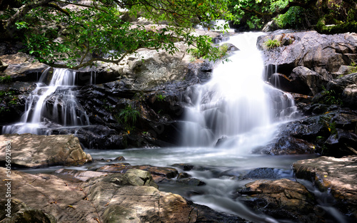 Little Hawaii Waterfall with silky water flow taken at Wilson hiking trail in Hong Kong with long exposure technique