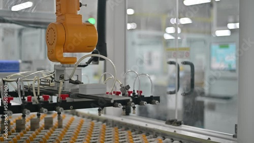 Hand robot stop working on machine conveyer line in factory 