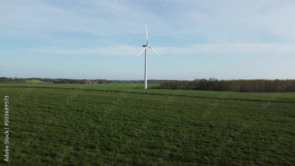 eco-friendly power generation, wind power generator, wind farm standing in a field eco-friendly power generation, wind power generator, wind farm standing in a field