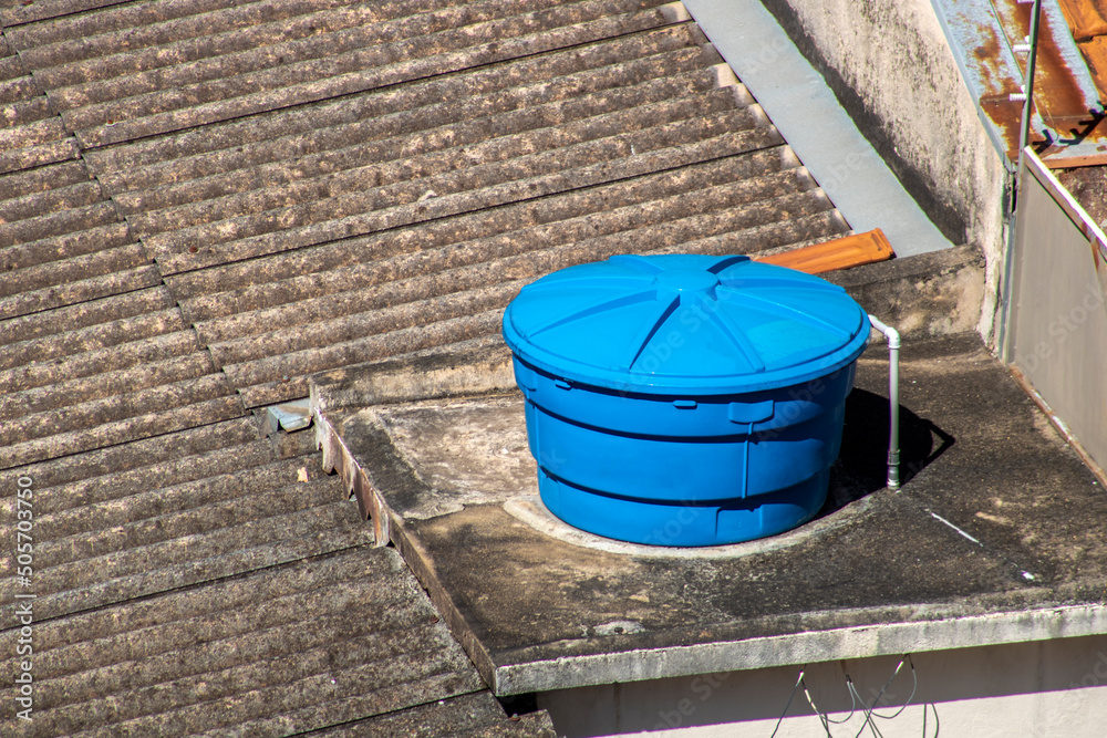 Εκτύπωση καμβά view of a water supply tank on top of the roof of a house in Brazil