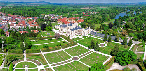 Lednice Chateau extra wide panorama aerial photography with garden and park on summer day. Lednice - Valtice landscape, Czech South Moravia region. World Heritage Site. photo