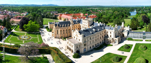 Lednice Chateau extra wide panorama aerial photography with garden and park on summer day. Lednice - Valtice landscape, Czech South Moravia region. World Heritage Site. photo