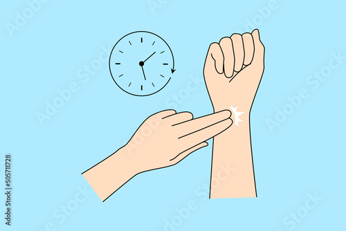 Person check radial pulse on wrist