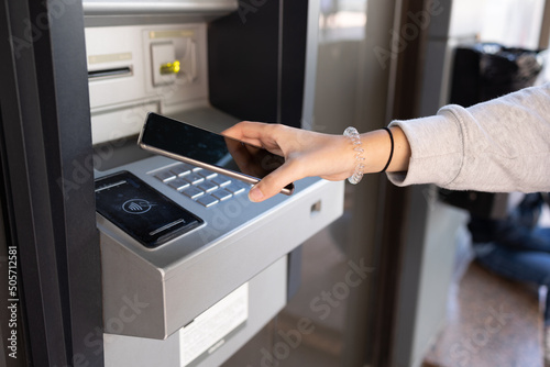 Using NFC technology at an ATM with a smartphone