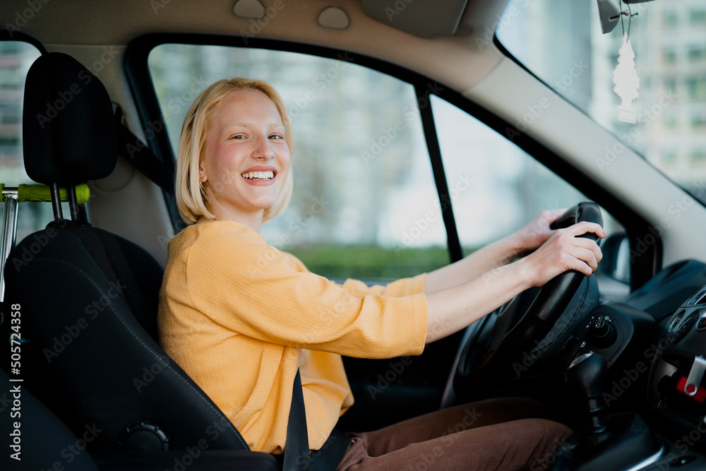 Beautiful woman driving a car.