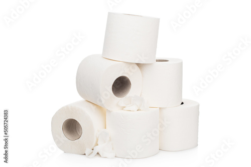 Rolls of white toilet paper stacked in a pyramid on a white isolated background