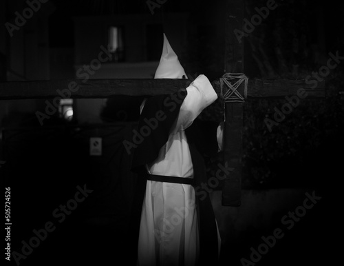 Portrait of a penitent wearing a capirote in Sorrento, IT during Easter procession  photo