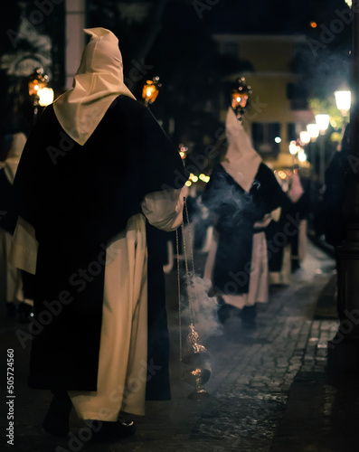 Penitent wearing a capirote in Sorrento, IT during Easter procession  photo