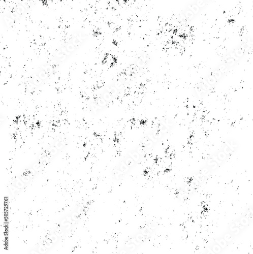 Small uneven spots and particles of debris. Abstract vector texture. Distressed uneven background. Grunge texture overlay with fine grains isolated on white background. Vector illustration. EPS10.