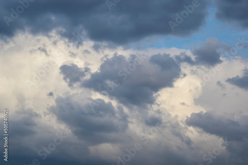 Picturesque sky with thunderstorms cumulus clouds. Overcast sky with big clouds. Air clouds background. Copy space. Soft focus