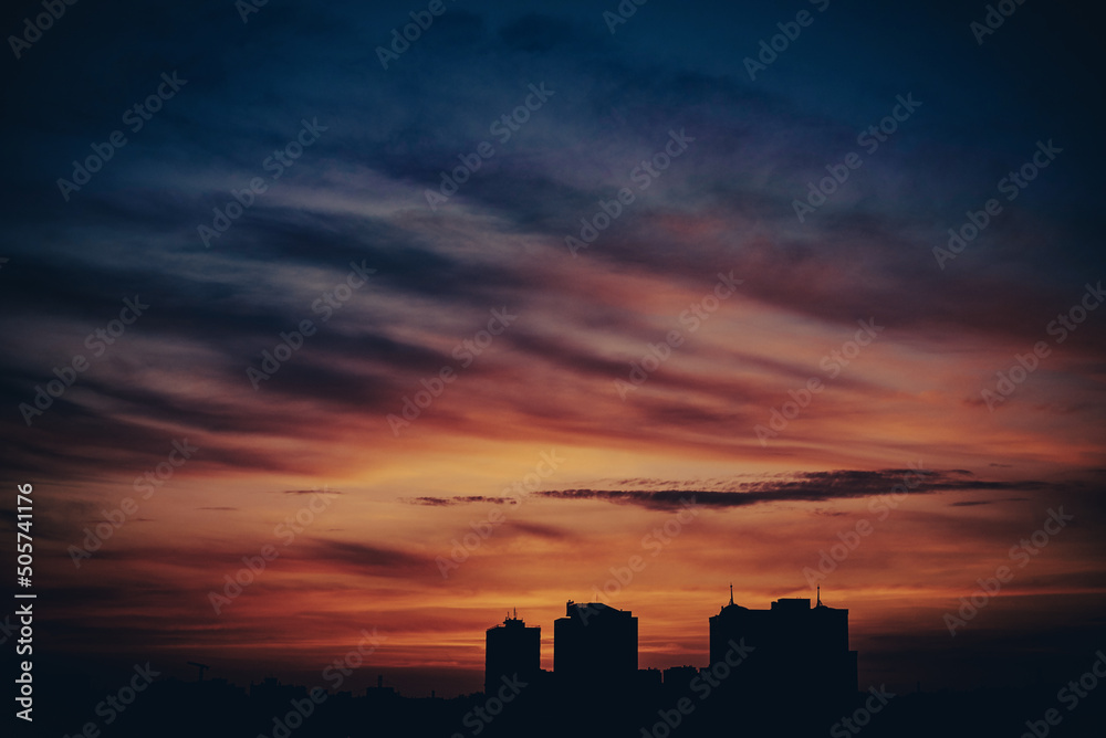 Glow sky and buildings silhouette during sunset