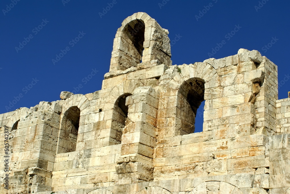 Arched openings in an ancient stone wall in Athens, Greece