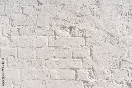 Old white brick wall. Clouseup background.