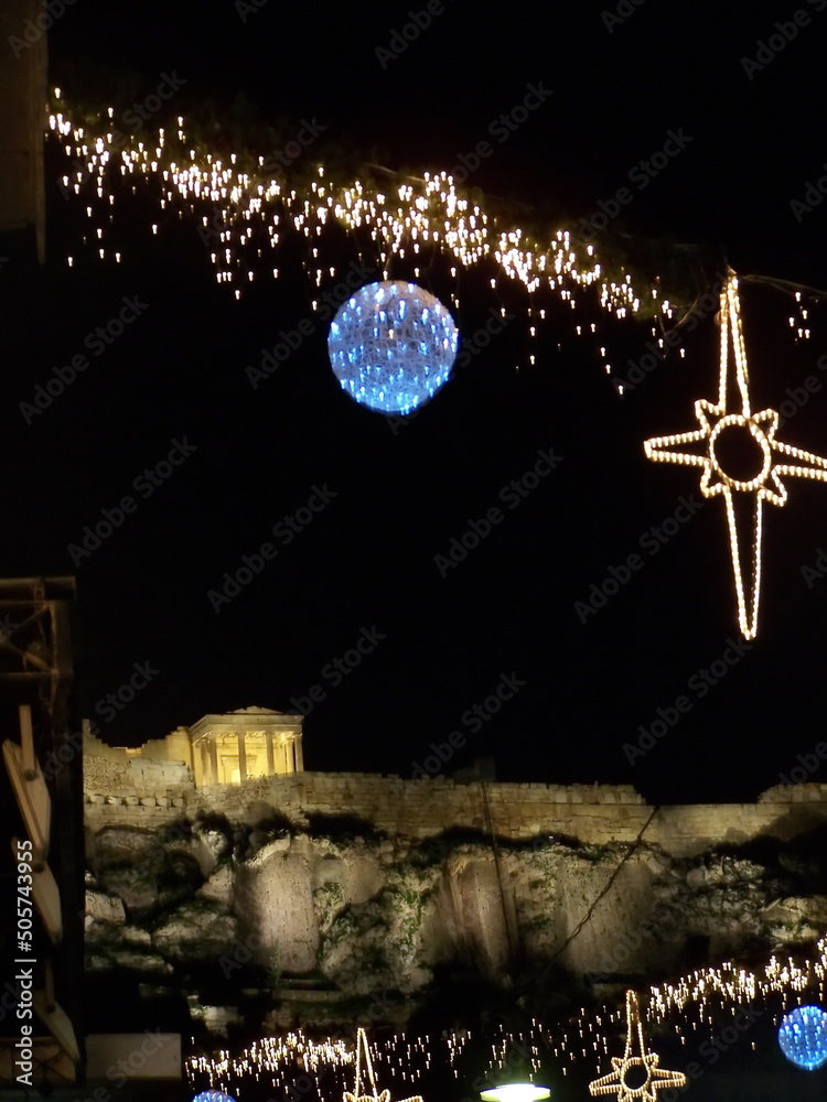 Φωτογραφία Christimas lights in front of the Parthenon in the Acropolis of Athens, Greece a
