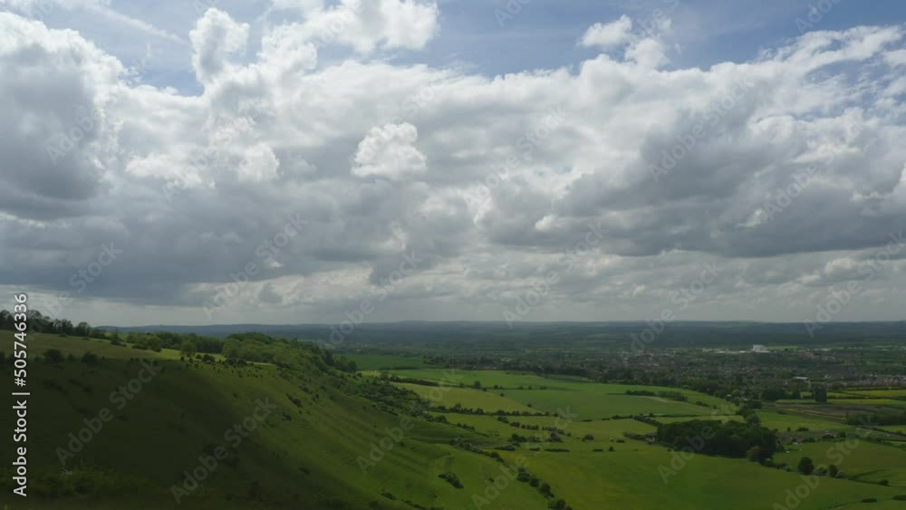 Shadows sweeping over the valley made by time lapse clouds. Rural scene Shadows sweeping over the valley made by time lapse clouds. Rural scene