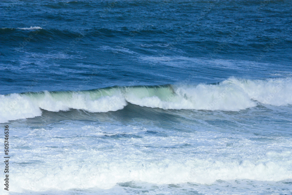 BEACH WITH ROUGH SEA AND WAVES WITH SUNNY SKY BEACH WITH ROUGH SEA AND WAVES WITH SUNNY SKY