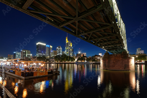 Frankfurt am Main Skyline bei Nacht, am Mainufer, unterm Eisernen Steg photo