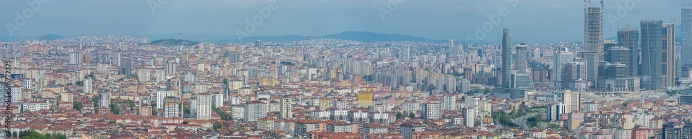 Turkey, Istanbul, Panoramic aerial view of a wide populated area on the Anatolian side of the city, roofs and skyscrappers photo